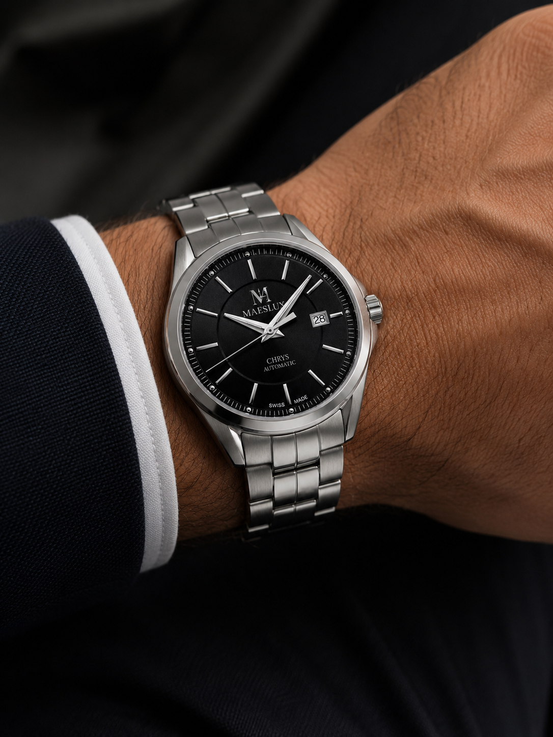 Swiss automatic watch CHRYS model shown on wrist with stainless steel bracelet and black dial.