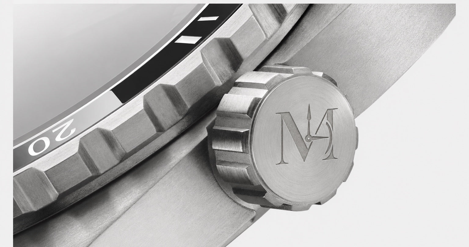 Engraved MAESLUX crown and titanium case detail